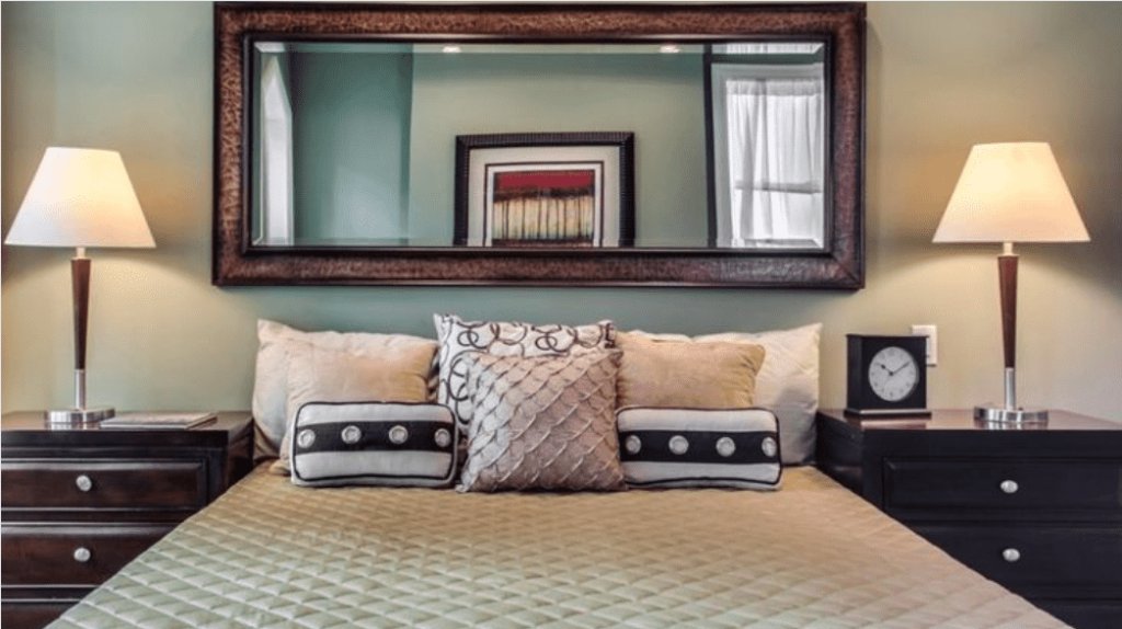 large mirror above bed
