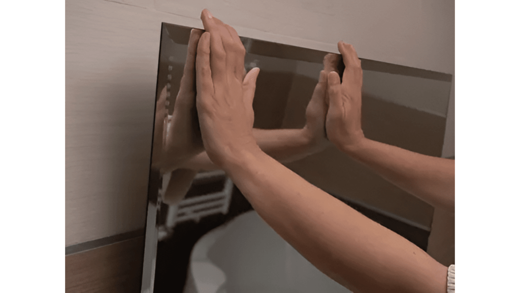 mirror mounted using Velcro Strips, how to hang a mirror 